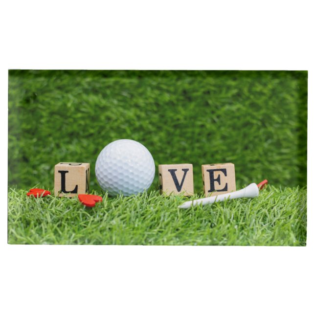 Golf ball with LOVE word and tee on green grass Place Card Holder (Front)
