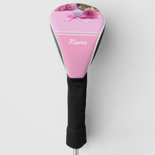 Golf ball with pink ribbon and pink roses on pink golf head cover