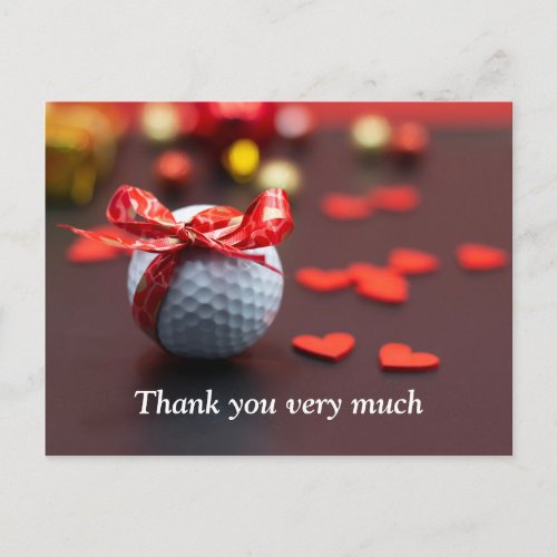 Golf ball with red ribbon with love red hearts postcard