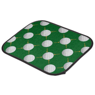 Golf balls and Tees on Green Car Floor Mat