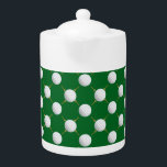 Golf balls and Tees on Green Teapot<br><div class="desc">Fathers and Mothers everywhere who play a leisurely game of Golf will understand the call of the grass and the hole in one! Green background ,  golf balls and tees in a pleasing pattern. Great for father's day.</div>