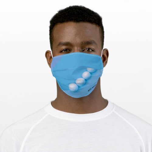 Golf balls are on blue background for golfer adult cloth face mask