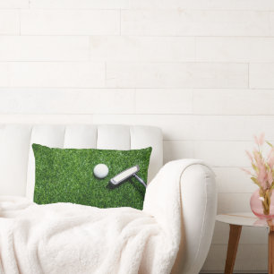 Golf Balls are on green grass Lumbar Pillow