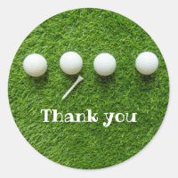 Golf balls are on green grass thank you classic round sticker
