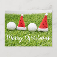Golf Christmas card with Santa hat on green grass