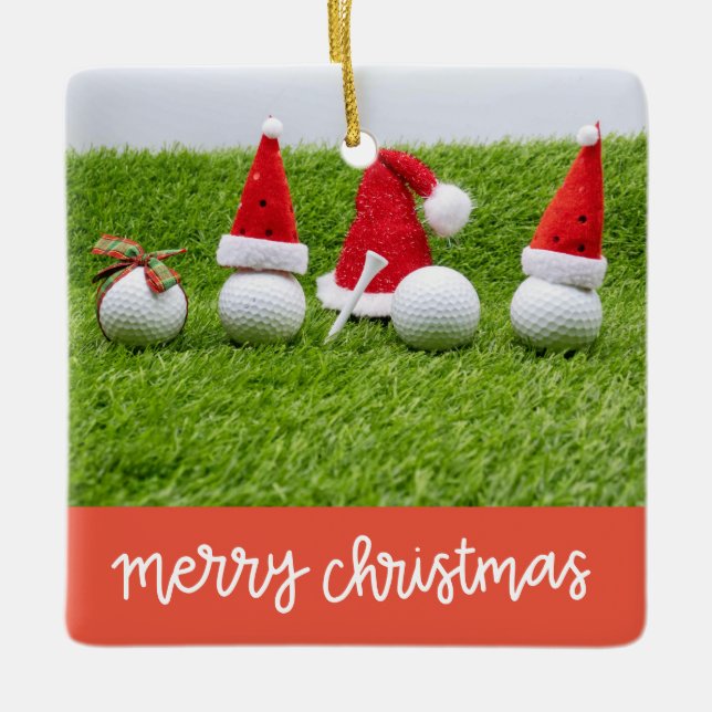 Golf Christmas gifts with ball and tee on green    Ceramic Ornament (Front)