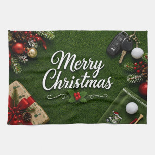 Golf Christmas themed on green grass Kitchen Towel