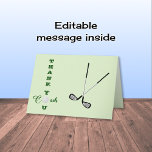 Golf coach sports thank you card<br><div class="desc">This card has crossed golf clubs on the front and the message "THANK YOU COACH", with a golf ball taking the place of the 'O' in YOU and COACH. The background is a pale green. Inside there is a bouncing golf ball on a pale gradient wash background. The text is...</div>