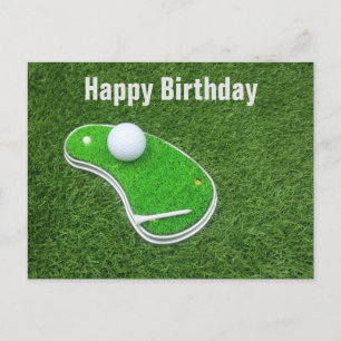 Golf course with tee on green grass background postcard