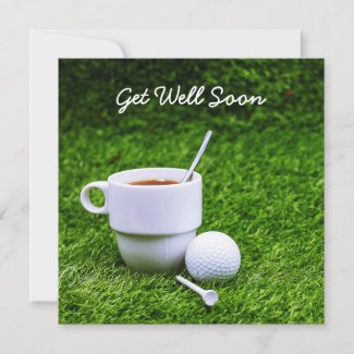 Golf get well soon with cup of tea and golf ball