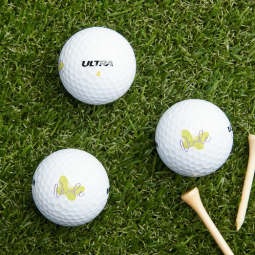 Golf green butterfly and purple script name golf balls