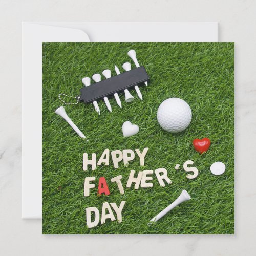 Golf Happy Fathers Day with tee and ball on green Card