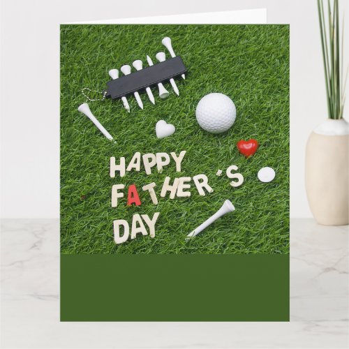 Golf Happy Fathers Day with tee and ball on green Card