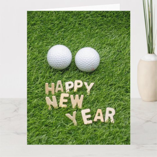 Golf Happy New Year with golf ball on green Card
