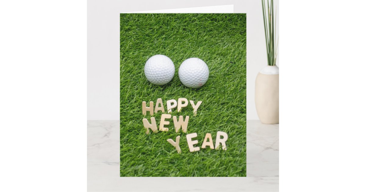 Golf Happy New Year with golf ball on green Card