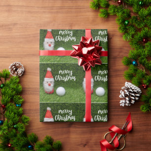 Golf Merry Christmas with golf ball on green Wrapping Paper