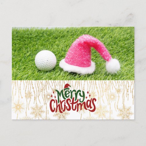 Golf Merry Christmas with Santa hat on green grass Announcement Postcard