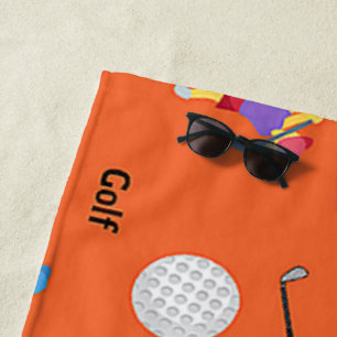 Golf pattern on orange beach towel