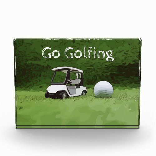 Golfer go golfing with golf buggy cart on green photo block