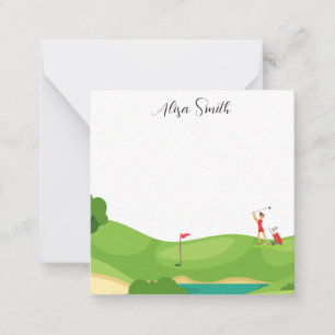 Golfer Woman is on green grass in golf course Note Card