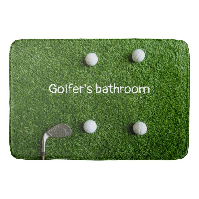 Golfer's bathroom with golf balls on green grass bath mat (Front)