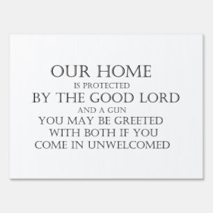 good lord and a gun yard sign
