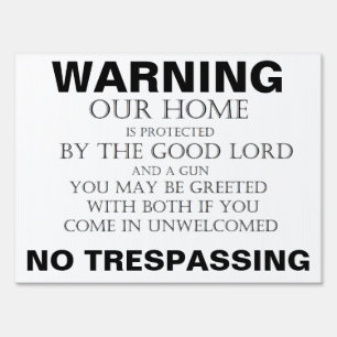 good lord and a gun yard sign