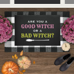 Good Witch or a Bad Witch Black Halloween Quote Doormat<br><div class="desc">This funny Halloween doormat features the quote "Are you a good witch or a bad witch?" typography design in white,  pink,  and yellow green colors with witch's broomstick accent.</div>