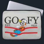 Goofy Est. 1932 Laptop Sleeve<br><div class="desc">Celebrate a legacy of laughter with this classic "Goofy Est. 1932" heritage design! Blending timeless collegiate-style typography with dynamic Goofy character art, this graphic captures a moment of pure, clumsy joy. The bold black serif lettering is accented by vibrant red racing stripes, giving the piece an athletic, vintage-sportswear feel. The...</div>