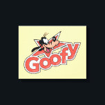 Goofy Retro Star Power Graphic Canvas Print<br><div class="desc">Make a statement with this high-impact, Goofy logo-style design! Featuring a cheerful Goofy peaking out from behind a bold, red shooting star, this artwork perfectly blends vintage animation vibes with a classic pop-art aesthetic. The custom, thick-contoured typography and textured red fill give the design a high-quality "decal" look that feels...</div>