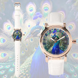 Gorgeous peacock with teal and gold plumage watch<br><div class="desc">This Watch features a gorgeous peacock design in wonderful teal,  royal blue and gold colors. Romantic and elegant motif. Perfect and personalizable gift for any occasion.</div>