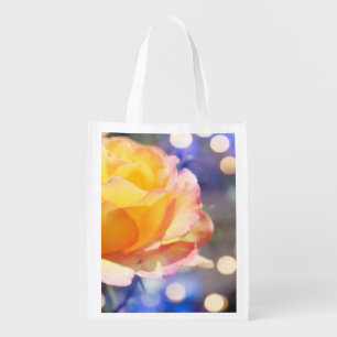Gorgeous yellow rose flower in fancy bubbling grocery bag