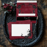 Gothic Black Raven & Black Roses Wine Wedding Envelope<br><div class="desc">Transport your guests to a world of dark, enchanting elegance with our vintage gothic wedding invitation envelope. The deep, aged distressed burgundy red background sets the stage for a striking contrast. The front text area is adorned with an intertwining vine of black roses, which adds a touch of dramatic allure....</div>