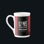 Gothic Red Roses Love at First Bite Wedding Bone China Mug<br><div class="desc">Celebrate your Gothic-themed special day with this striking oversized coffee mug, which features the sappy, pun-filled sentiment, "Love at First Bite" in Goth-inspired lettering (and the outline of a rose, standing in for the letter 'O'). Customize with newlyweds' names and wedding date. Design © W.H. Sim. See more at zazzle.com/expressionsoccasions...</div>