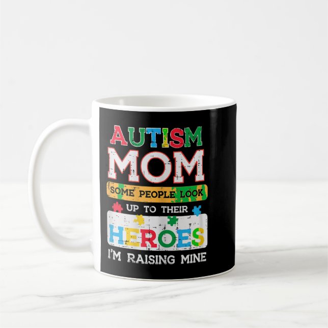 Grab this cute Autism Mom Heroes Raising Mine T-Sh Coffee Mug (Left)