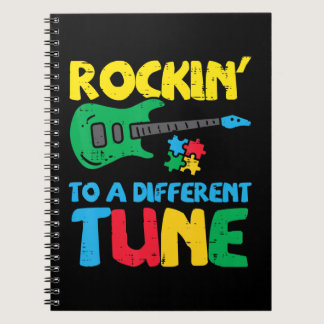 Grab this cute Rockin To Different Tune Guitar T-S Notebook