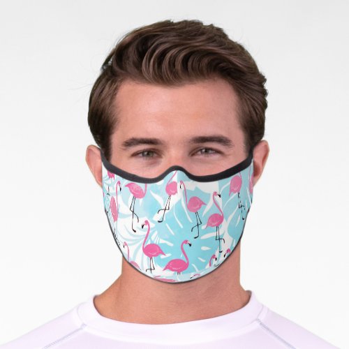 Graceful flamingos and monstera leaves premium face mask