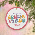 Graduate Senior Vibes Class of 2025 Christmas Ceramic Ornament<br><div class="desc">A perfect gift for the senior set to graduate soon. The design features multi-colored retro text reading "Senior Vibes". Personalize with holiday ornament with the grad's name.</div>