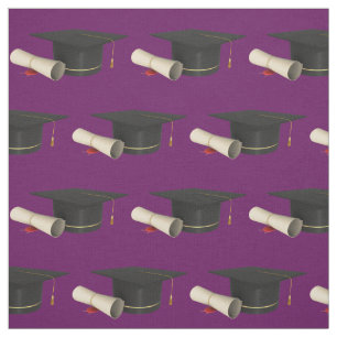 Graduation Cap and Diploma on Purple Fabric