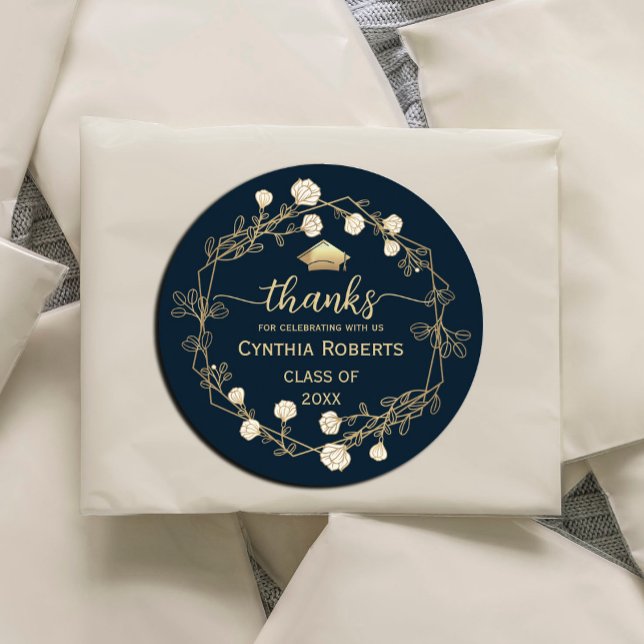 Graduation Thank You Navy Blue Gold Floral Classic Round Sticker (a gold frame adorned with white and gold flowers, with a gold graduation cap. #gradparty #Graduation)