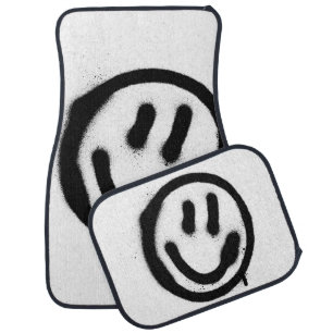 graffiti smiling face emoticon in black on whitesp car floor mat