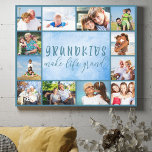 Grandkids Make Life Grand Stylish Blue 12 Photo Canvas Print<br><div class="desc">Blue wrapped photo canvas with lovely grandkids quote. The photo template is set up ready for you to upload 12 of your favorite photos which are displayed as a border around the grandparents saying. The wording reads "Grandkids make life grand" in hand lettered, quirky uppercase print and elegant script typography....</div>