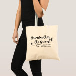Grandmother of the Groom Tote Bag | Modern Script<br><div class="desc">The Grandmother of the Groom will love this personalized tote bag! A fun trendy script font and swirl embellishment adorn the front of the bag and below there's space for two lines of custom text - add the GrandMother of the Groom's name, your wedding date, location, etc. Timeless and classic,...</div>