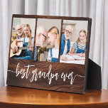 Grandpa Grandchildren Wood Photo Collage Plaque<br><div class="desc">Capture the love between Papa and his grandchildren with our Grandpa Grandchildren Photo Collage Plaque. This personalized plaque features a heartwarming photo collage, beautifully displaying cherished moments shared between Papa and his beloved grandchildren. Surrounding the photos is the endearing title "Papa, " adding a special touch to the design. Crafted...</div>