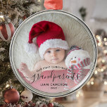 Grandparents First Christmas Photo Black Script Metal Ornament<br><div class="desc">Help them celebrate their first grandchild with this beautiful modern keepsake ornament. The off-black text reads "Our first Christmas as grandparents, " with the word "grandparents" in elegant handwriting script with flourishes before and after. Easily replace the sample image with your favorite photo of the new baby, and add his...</div>