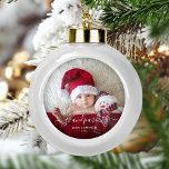 Grandparents First Christmas Photo White Script Ceramic Ball Christmas Ornament<br><div class="desc">Help them celebrate their first grandchild with this beautiful modern keepsake ornament. The white text reads "Our first Christmas as grandparents, " with the word "grandparents" in elegant handwriting script with flourishes before and after. Easily replace the sample image with your favorite photo of the new baby, and add his...</div>