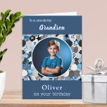 Grandson Birthday Blue Trendy Modern Photo Card<br><div class="desc">This birthday card can be personalized with your grandson's name, and a favorite photo. Your chosen photograph will appear in a round white 'frame' within a fun abstract pattern in a modern style. The text at the top of the card is 'To a wonderful Grandson', with his name below the...</div>