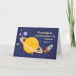 Grandson Birthday Planets in Outer Space, Rocket Card<br><div class="desc">Wish your grandson a happy birthday that is out of this world! Saturn is seen in the golden yellow color with stars and other planets surrounding it. A rocket ship has just blasted off to wish happy birthday.</div>