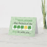 Grandson, Luck of the Irish St. Patrick's Day Clov Card<br><div class="desc">Send your Grandson St. Patrick’s Day wishes with this green shamrock card. Lucky 4 leaf clovers fill the front as the main images as well as small ones are scattered in the background.</div>