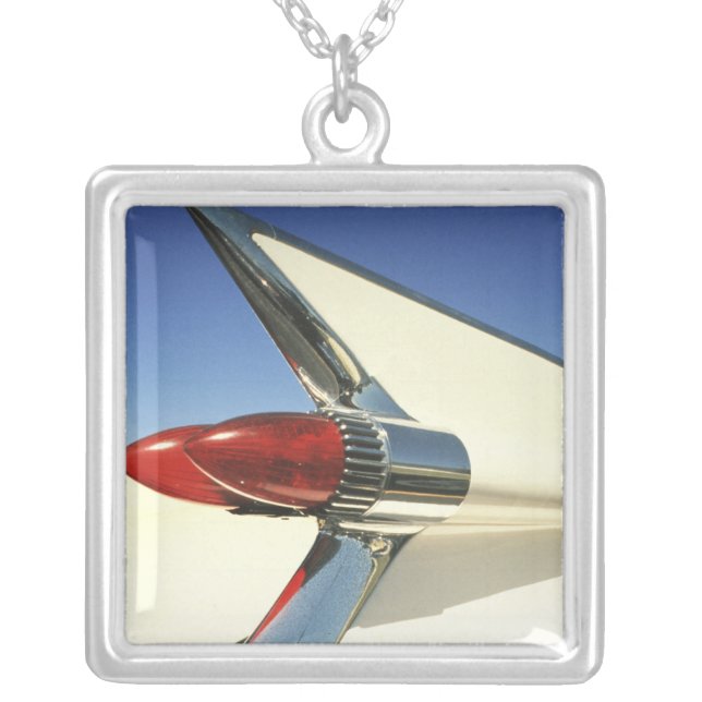 Graphic: Close-up of fin and taillight on Silver Plated Necklace (Front)